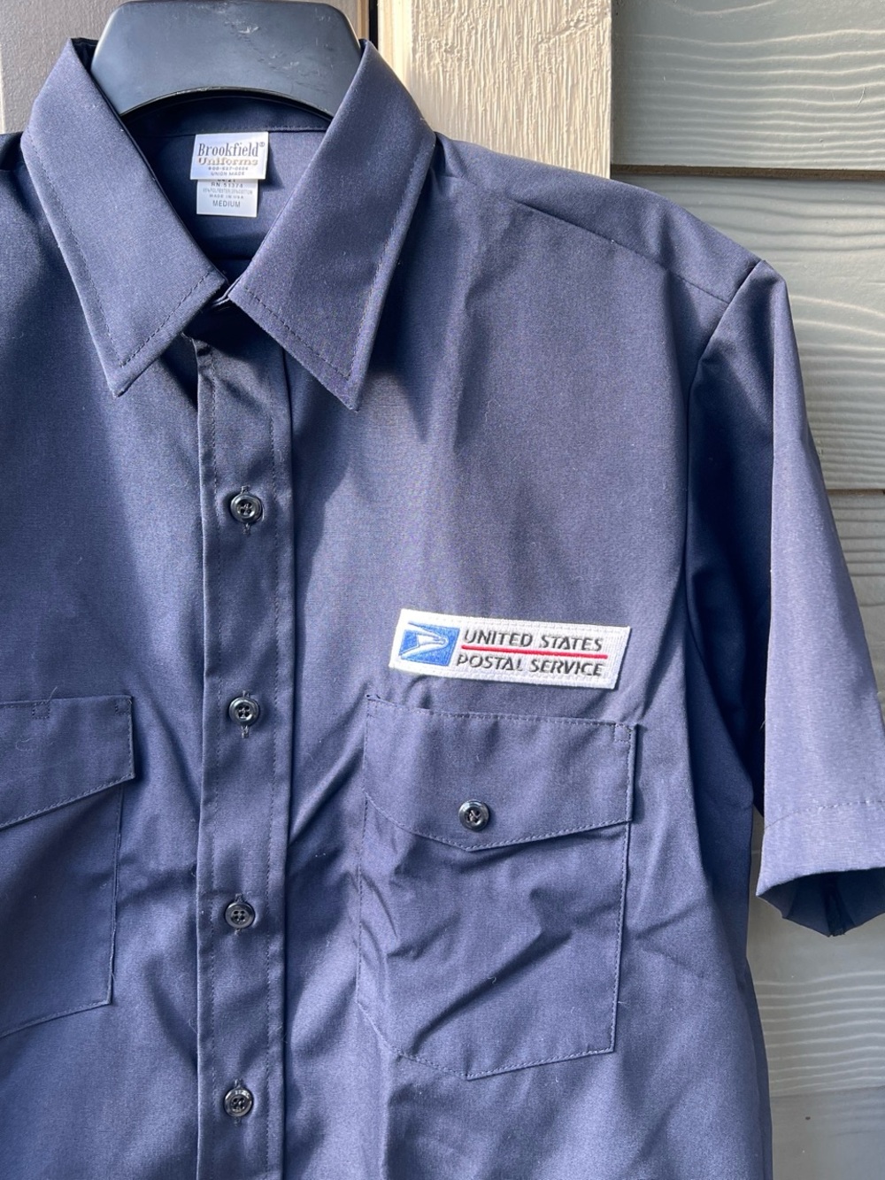 USPS postal button up